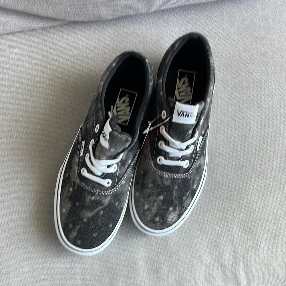 Vans Women’s Black and White Sneakers. Never worn w/ tags attached.